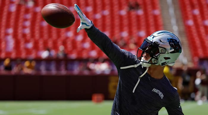 Aug 13, 2022; Landover, Maryland, USA; Carolina Panthers running back Christian McCaffrey (22) catches a pass during warmups prior to the Panthers’ game against the Washington Commanders at FedExField.